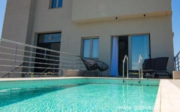 Appartamenti di lusso IO Suites, alloggi privati a Mitikas, Grecia