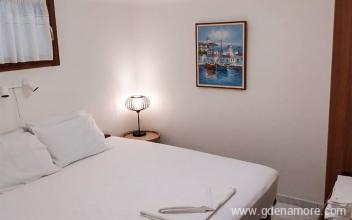 Apartmaji s pogledom na Jamajko, zasebne nastanitve v mestu Vourvourou, Grčija