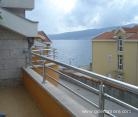 White apartments, private accommodation in city Bijela, Montenegro