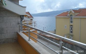 White apartments, private accommodation in city Bijela, Montenegro