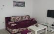 Една спалня в Апартаменти Giardino, частни квартири в града Djenović, Черна Гора